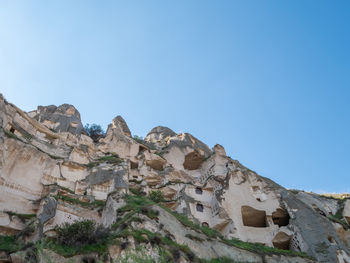 Low angle view of castle against clear blue sky