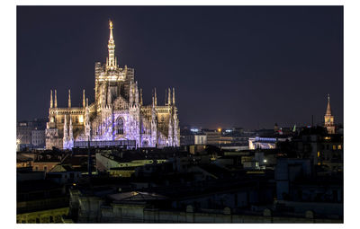A night view of the milan cathedral photographed from the roof of the palazzo di piazza affari