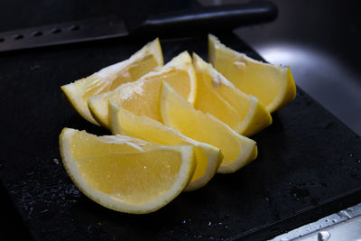 Close-up of sliced lemons on table