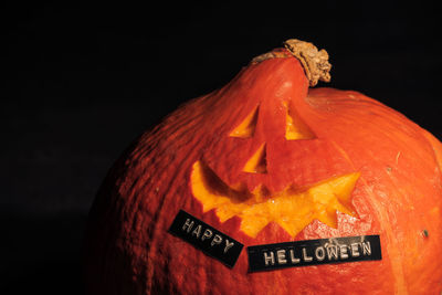 Close-up of pumpkin against black background