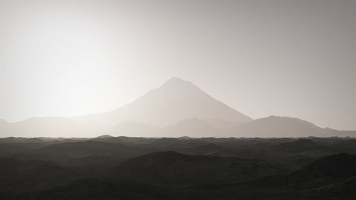 Idyllic shot of landscape against sky during sunset