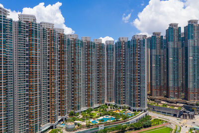 Panoramic shot of buildings against sky in city