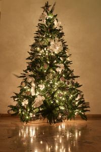 Close-up of christmas tree at night