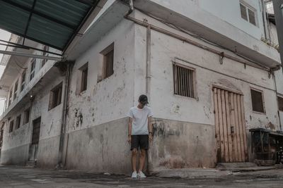 Man standing in the urban old town in bali