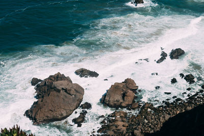 High angle view of rocks on beach