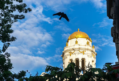 Low angle view of built structure against blue sky