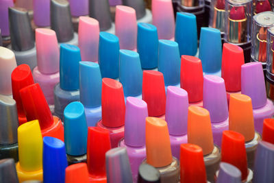 Full frame shot of colorful nail polish bottles at market