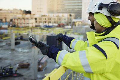 Two engineers working at construction site