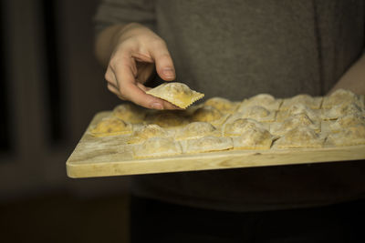 Close-up of person preparing food