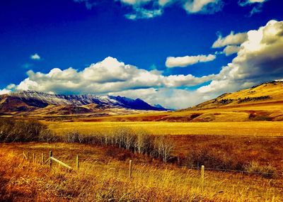 View of landscape against cloudy sky