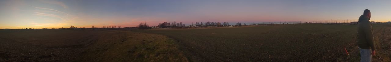 Panoramic view of land against sky during sunset
