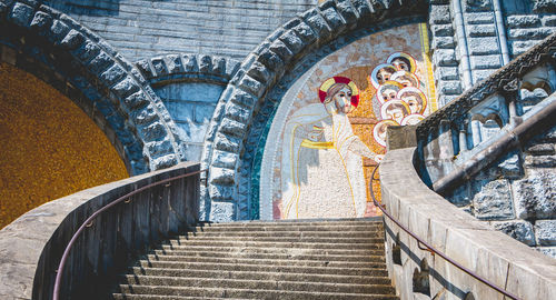 Low angle view of statues on steps of building