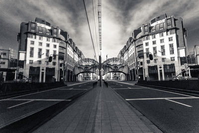 Road in city against sky