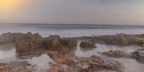 Scenic view of sea against clear sky