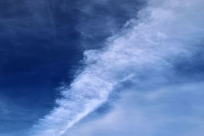 Low angle view of vapor trail in sky