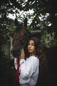 Close-up of horse standing on field