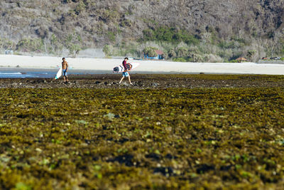 Young men at the beach, sumbawa,indonesia