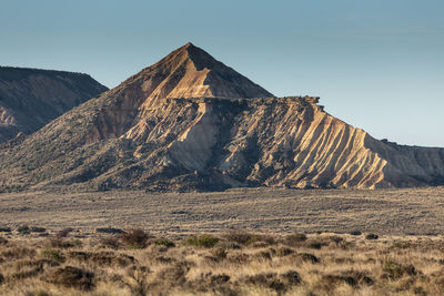 Scenic view of rocky mountains against clear sky