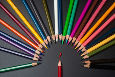 High angle view of multi colored pencils on table