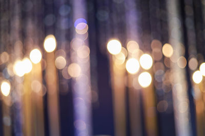 Defocused image of illuminated lights at night