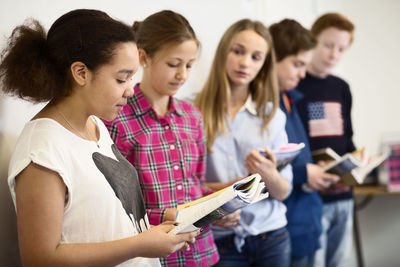 Students studying in classroom