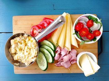 High angle view of chopped fruits on cutting board