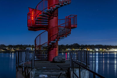 Spiral stairs against the river