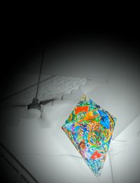High angle view of multi colored umbrellas on wall