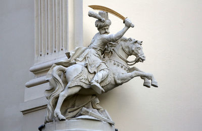 Horseman, architectural artistic decorations on facade of house in vienna, austria