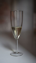 Close-up of wine in glass on table