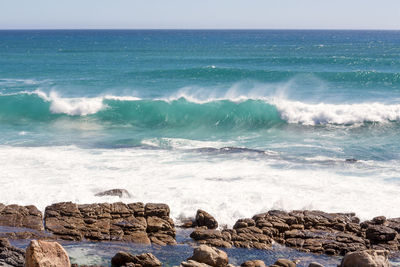 View of massive waves at scarborough beach, camel rock road, cape town area