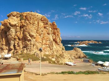 Scenic view of sea against blue sky