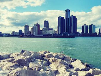 City skyline with sea in background