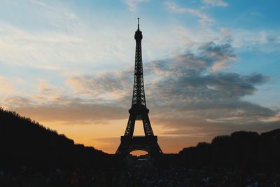 Low angle view of tower at sunset