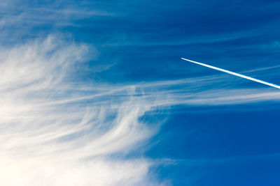 Aerial view of vapor trails in sky