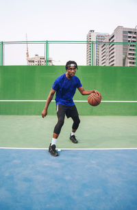 Portrait of the black man with the basketball