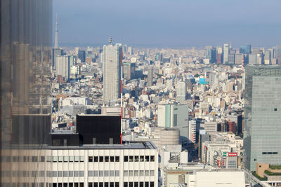 Modern buildings in city against sky