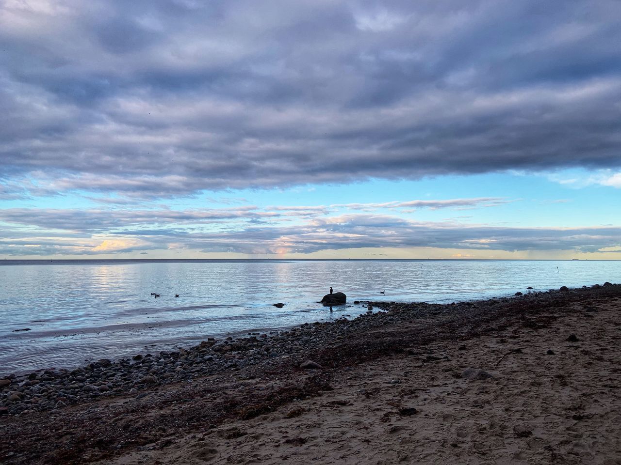 VIEW OF BEACH AGAINST SKY