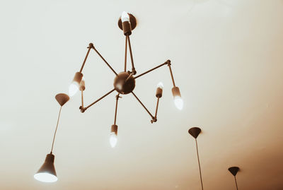 Low angle view of street light against sky