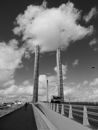 View of bridge against cloudy sky