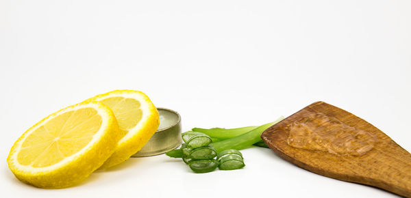 Close-up of fruits against white background