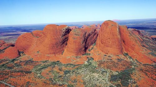 Scenic view of rock formations against sky