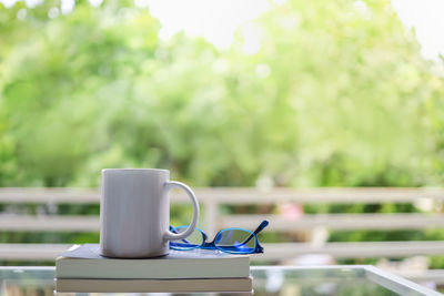 Close-up of coffee cup on table