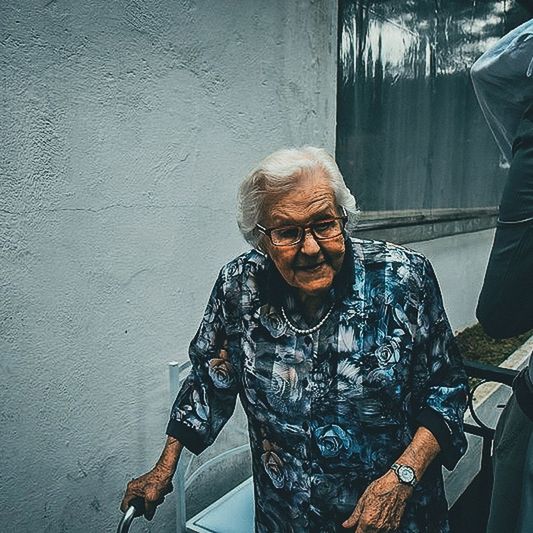 senior adult, front view, one person, real people, wall - building feature, adult, lifestyles, leisure activity, casual clothing, senior men, males, eyeglasses, men, day, glasses, architecture, built structure, outdoors