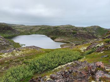 Scenic view of land against sky