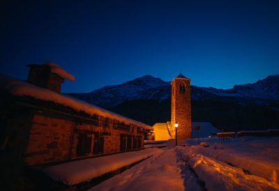 Low angle view of building against clear blue sky