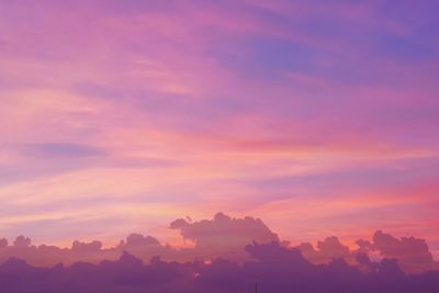 Low angle view of dramatic sky during sunset