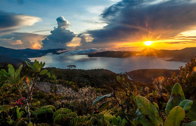 View of landscape against cloudy sky