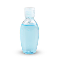 Close-up of glass bottle against white background