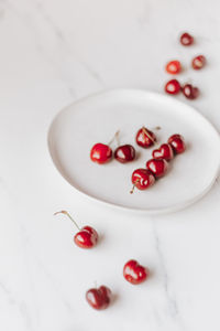 High angle view of cherries in bowl